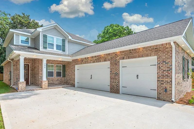 Two-story brick home with a three-car garage at 28A Meigs Dr, Shalimar